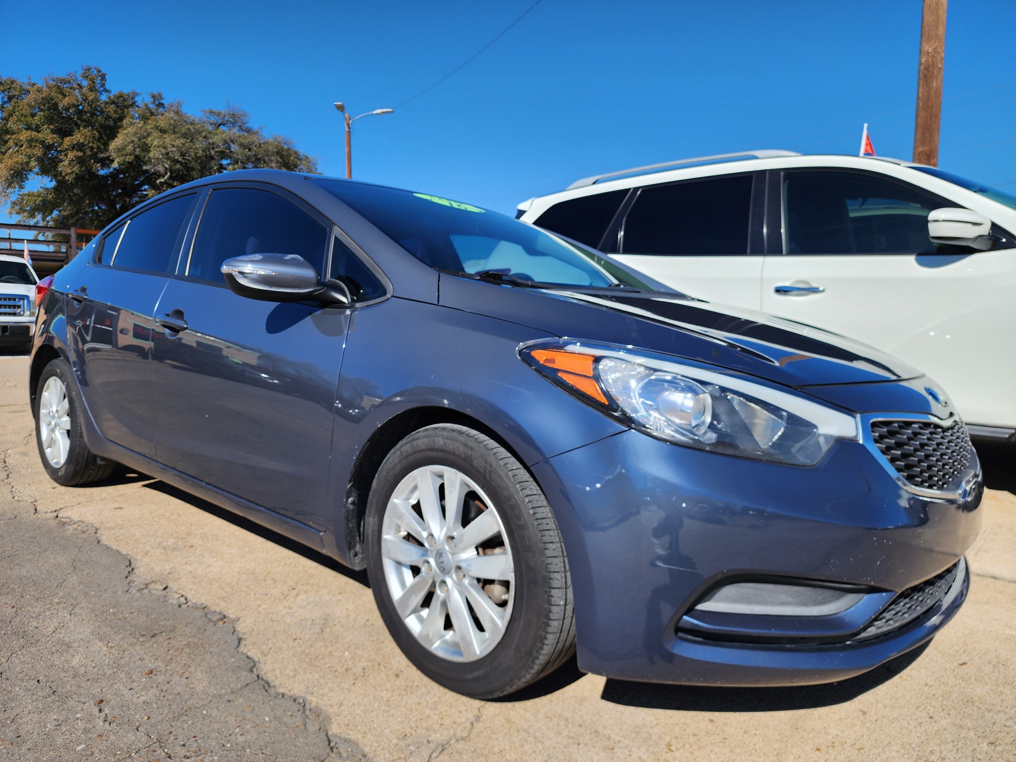 2016 BLUE Kia Forte LX (KNAFX4A65G5) with an 1.8L L4 DOHC 16V engine, 6-Speed Automatic transmission, located at 2660 S.Garland Avenue	, Garland, TX, 75041, (469) 298-3118, 32.885387, -96.656776 - Photo #1